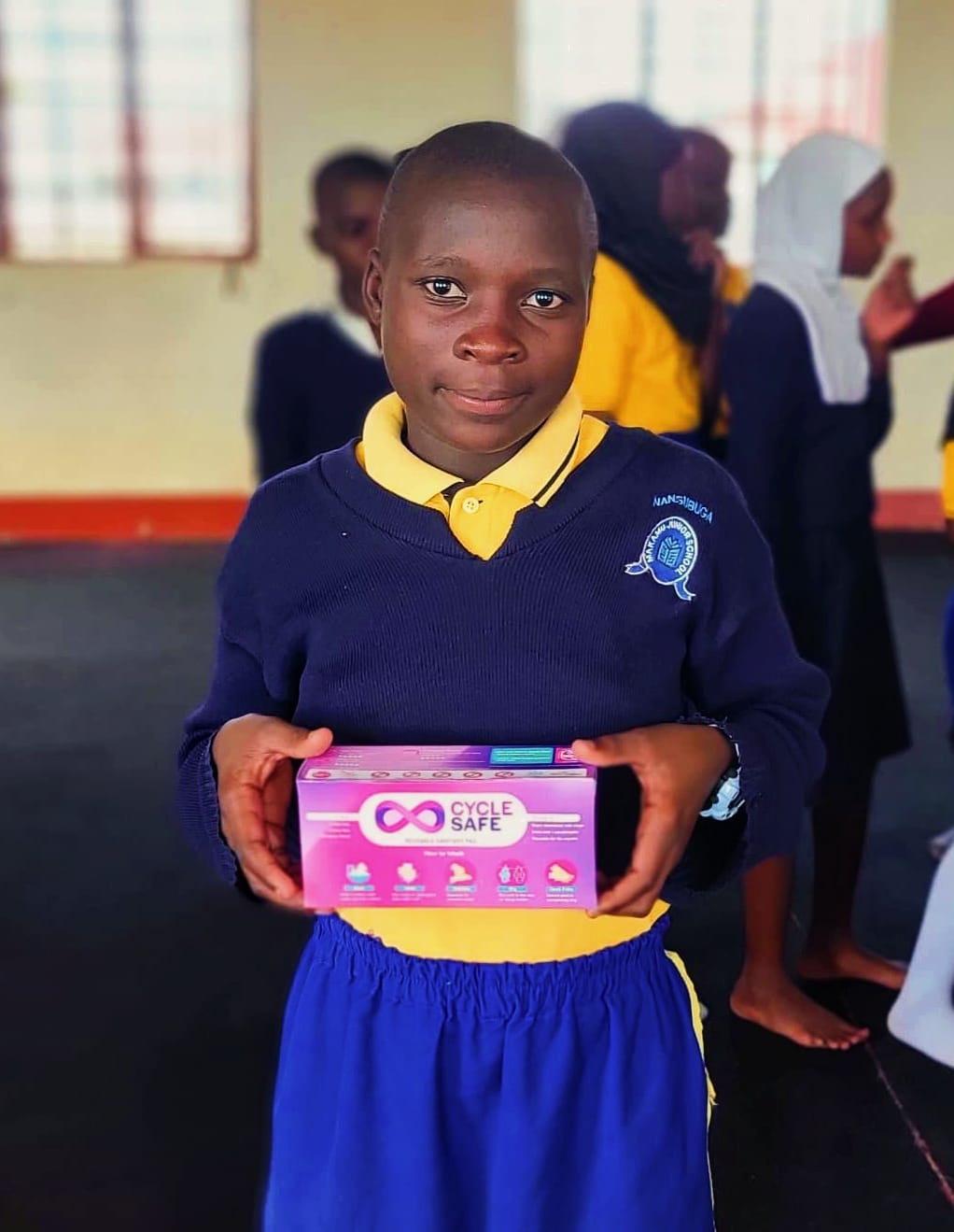 Students receiving reusable sanitary-pad sets in Uganda, photo 3