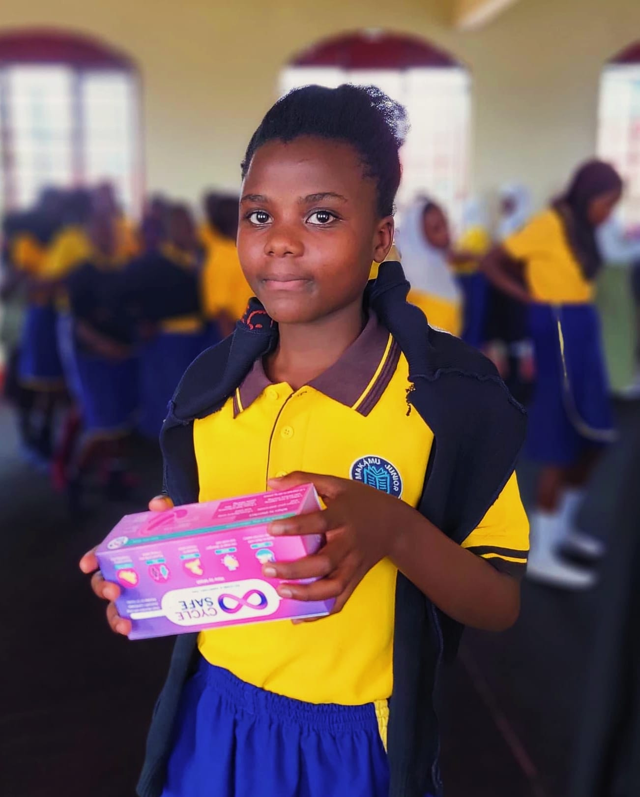 Students receiving reusable sanitary-pad sets in Uganda, photo 4